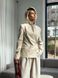 Milk-colored fitted faux leather jacket