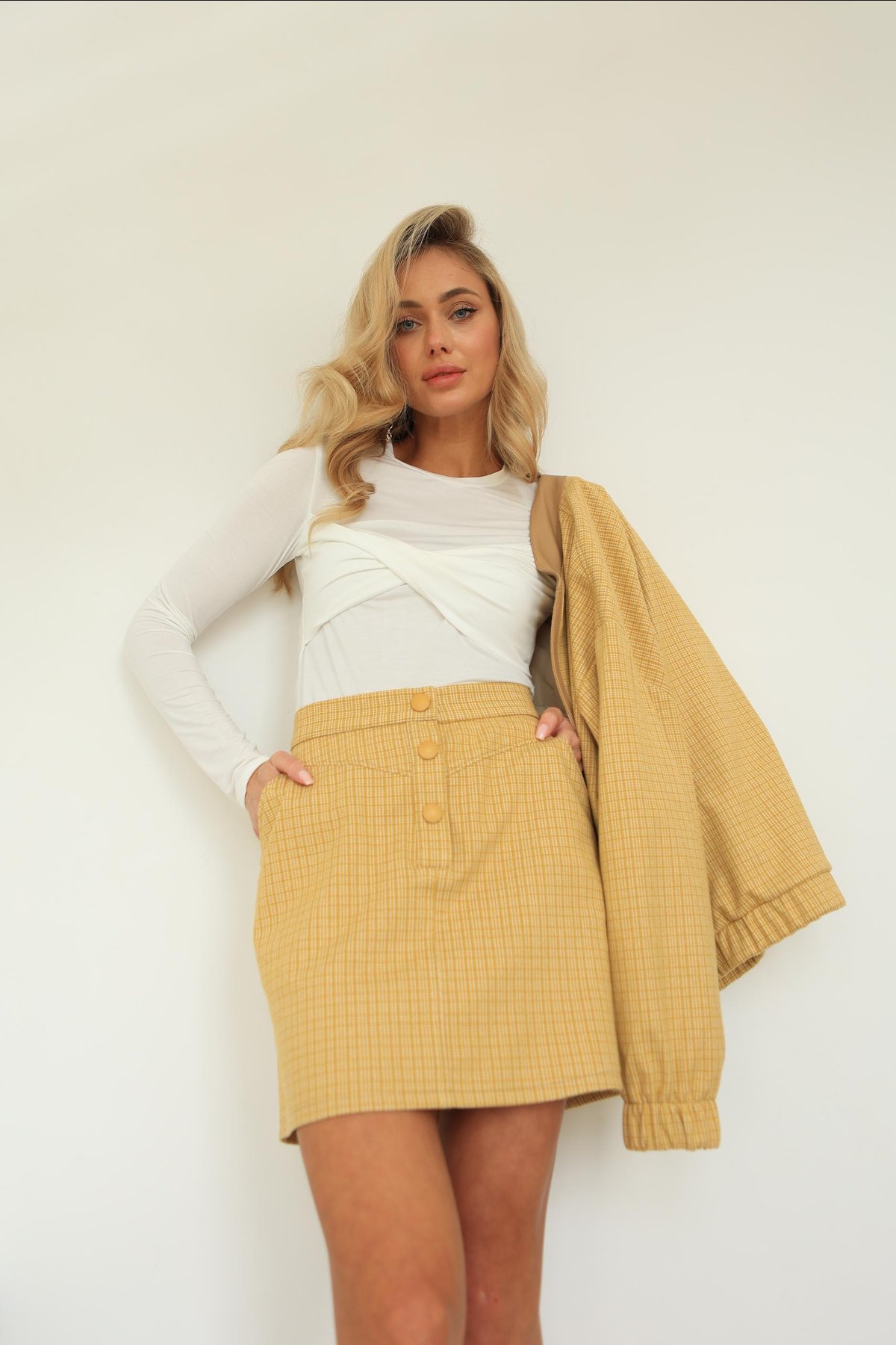 Beige skirt in a checkered pattern
