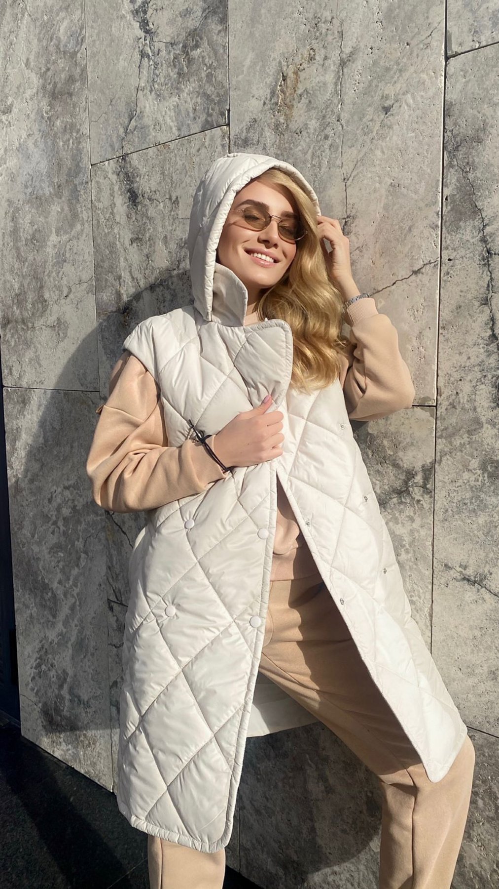 Quilted milk-colored vest